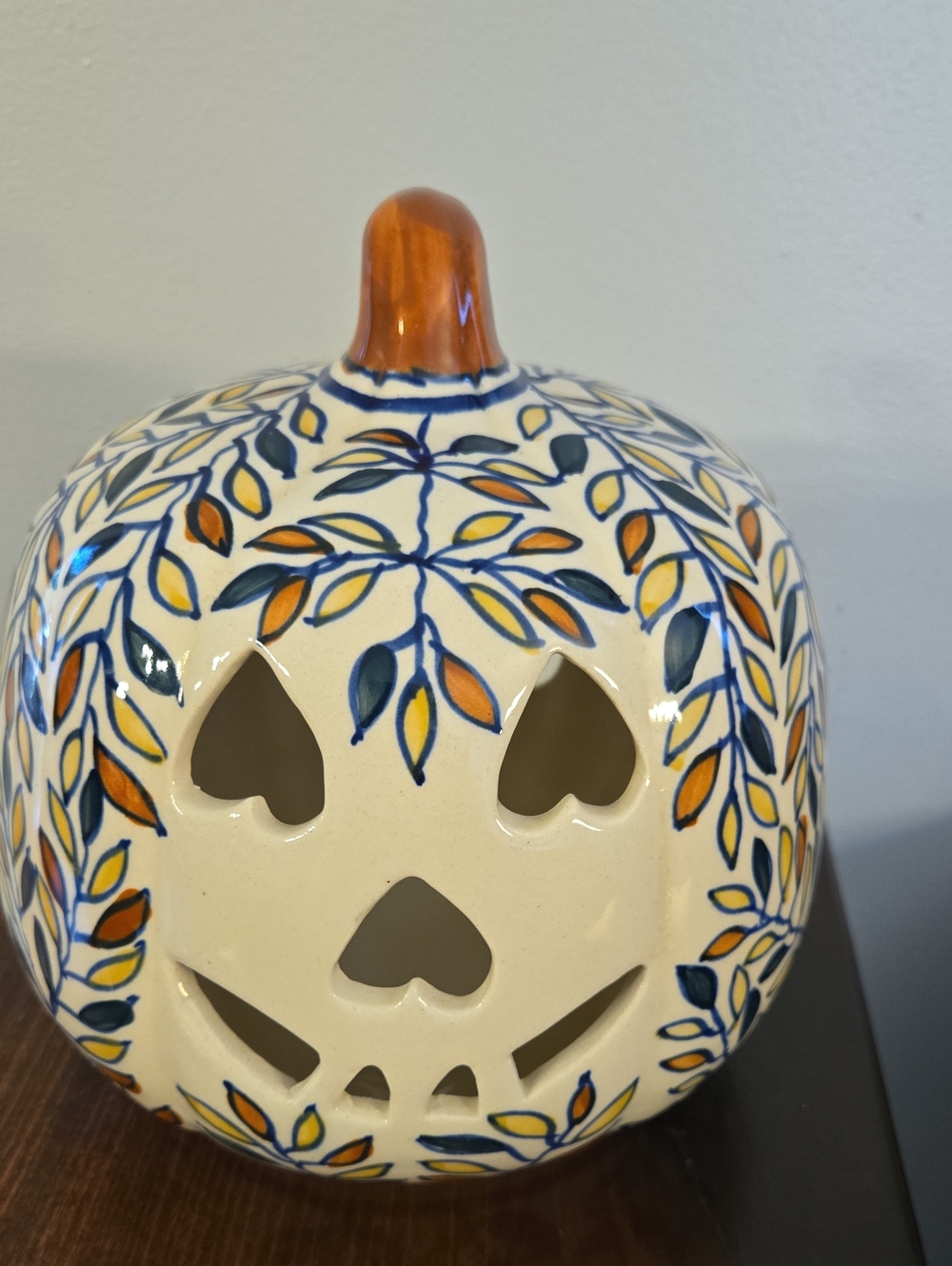 Hand-Painted Ceramic Pumpkin Lantern in Cream with Blue and Orange Leaf Motif